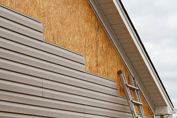 Professional Siding Contractor technician working in Westport, PA